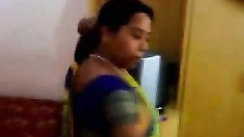 Bhabhi changing her blouse and peticot in bedroom which hubby is filming her and asking her to give some sexy poses.