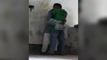 Patna, Bihar high school girl in coaching center roof after class with her boyfriend who passionately kissed her and pressing her juicy boob!.