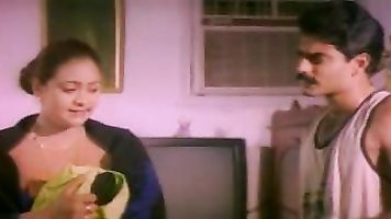 Newly married Indian couple enjoying their pyaar ki pehli raat.
