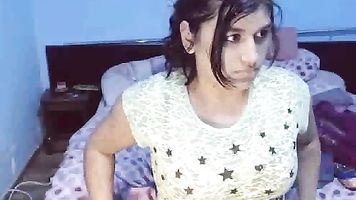Big breasted Roshnie masturbating fucking her fat pussy with her fingers on live cam show.