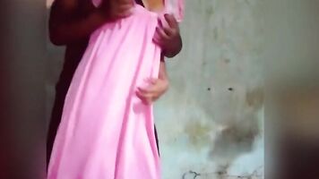 The milf, dressed in a nightgown, performs a beautiful dance with husband