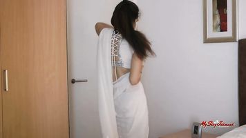 Jasmine lets you know she's here to tease you in her sexy traditional Indian sari.