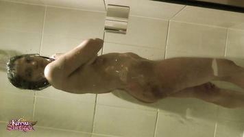 The shower head is the massager and she use it to drive herself into a frenzy.